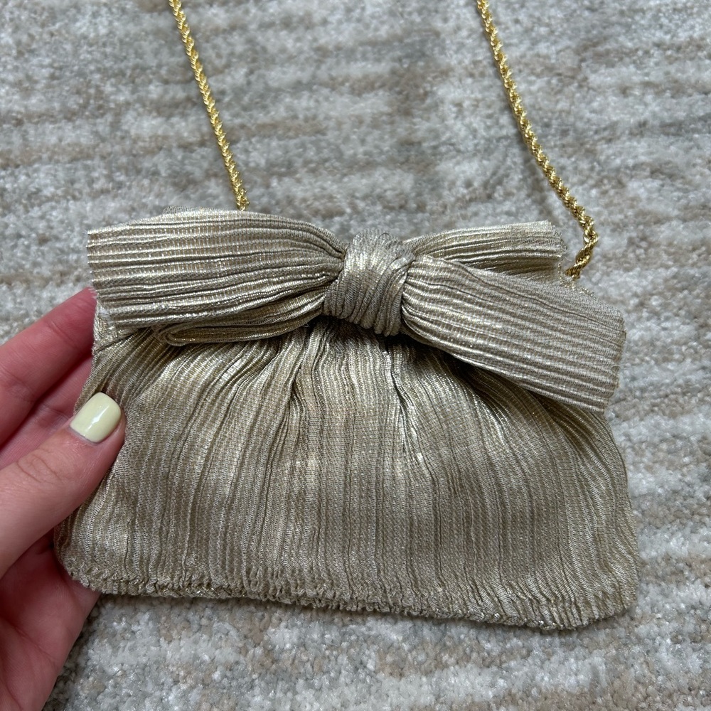 Loeffler Randall Mini Bow Clutch in gold. Originally bought for a wedding